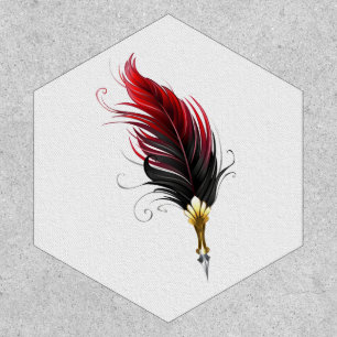 Red feather pen with gold nib patch
