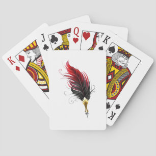 Red feather pen with gold nib poker cards