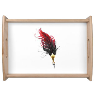 Red feather pen with gold nib serving tray