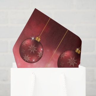 Red Festive Christmas Baubles On Red Bokeh Tissue Paper