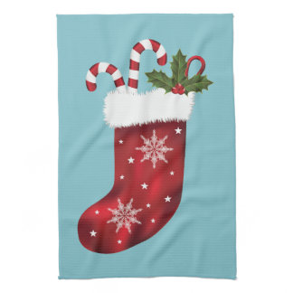 Red Festive Christmas Stocking On Blue Kitchen Towel