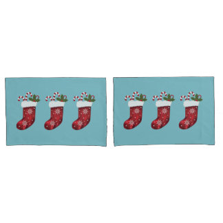 Red Festive Christmas Stockings On Blue Pillow Case