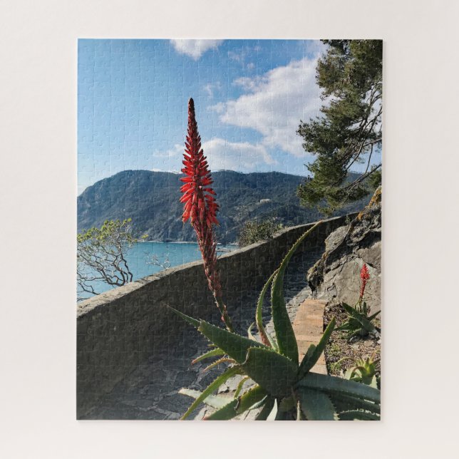 Red Flower Blue Sea Rocky Cliffs Puzzle (Vertical)
