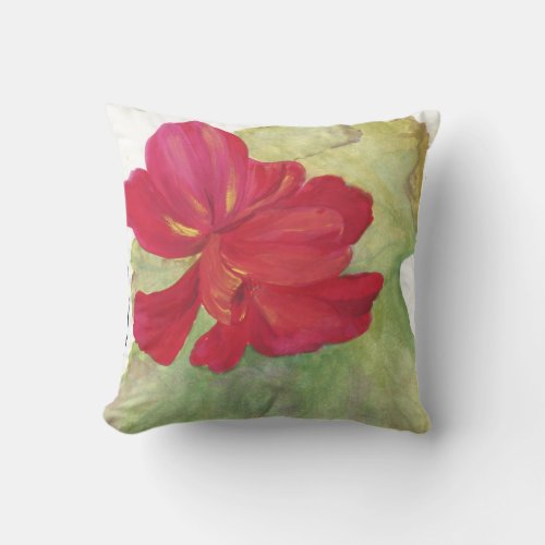 red flower on white pillow