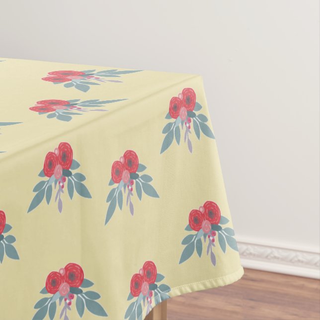 Red flowers and green leaves on brown  tablecloth (In Situ)