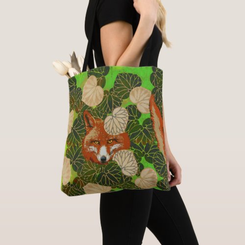 RED FOX AMONG THE GREEN LEAVES AND FOLIAGE TOTE BAG