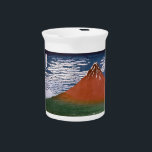 Red Fuji, Aka Fujiyama Volcano Katsushika Hokusai Beverage Pitcher<br><div class="desc">The scene captured in the Japanese woodblock print, "Fine Wind, Clear Morning" (also known as "Red Fuji" or "Aka Fuji"), is a breathtaking display of Mount Fuji bathed in the vibrant hues of sunrise. This artwork is part of Katsushika Hokusai's famed series, "Thirty-six Views of Mount Fuji, " created between...</div>