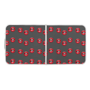 Red glossy lips on gray beer pong table
