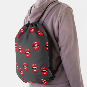Red glossy lips on gray drawstring bag