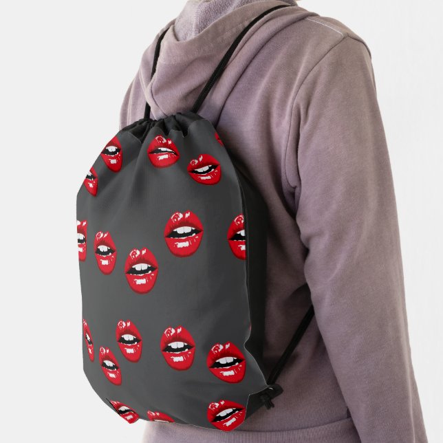 Red glossy lips on  gray drawstring bag (Insitu)