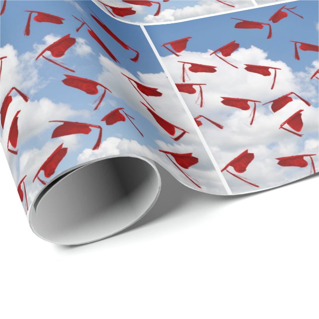 Red graduations hats in sky wrapping paper (Roll Corner)