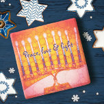 Red Hanukkah Menorah Peace Love Light Script Bold Stone Coaster<br><div class="desc">“Peace, love & light.” A close-up photo of a bright, colorful, red orange and yellow gold artsy menorah helps you usher in the holiday of Hanukkah in style. Feel the warmth and joy of the holiday season whenever you relax with your favorite beverage on this stunning, colorful Hanukkah stone coaster....</div>
