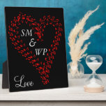 Red Heart Couple's Monogram Plaque<br><div class="desc">Large red heart formed from musical notes in the center against a black background.  Couple's monogrammed initials are written inside of romantic heart in silver grey text.  Love is written below heart in pretty script.  Nice gift idea for your sweetheart. Original Artwork Design by TamiraZDesigns.</div>