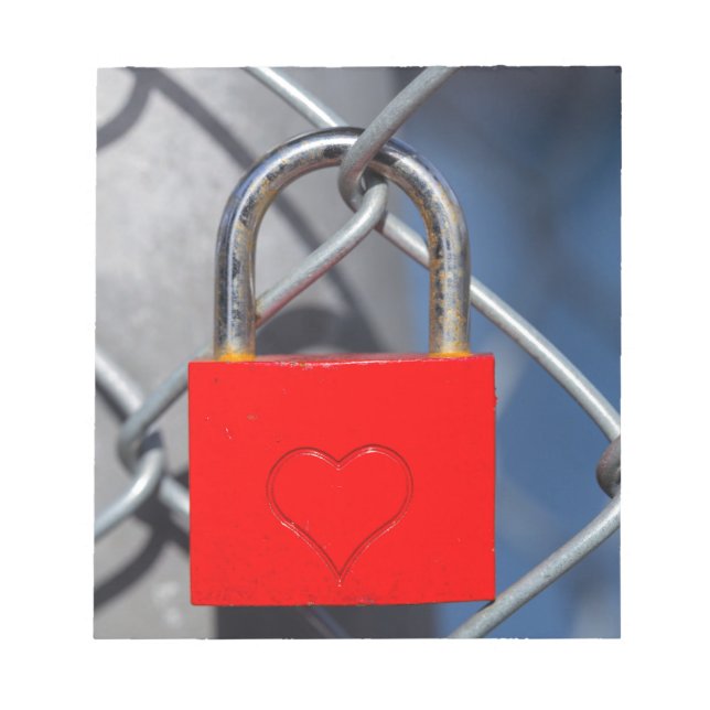 Red heart lock on fence notepad (Front)