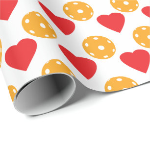 Red hearts and orange pickleballs wrapping paper