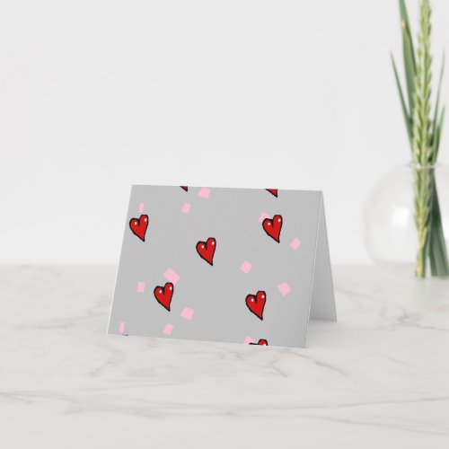 Red hearts on grey card