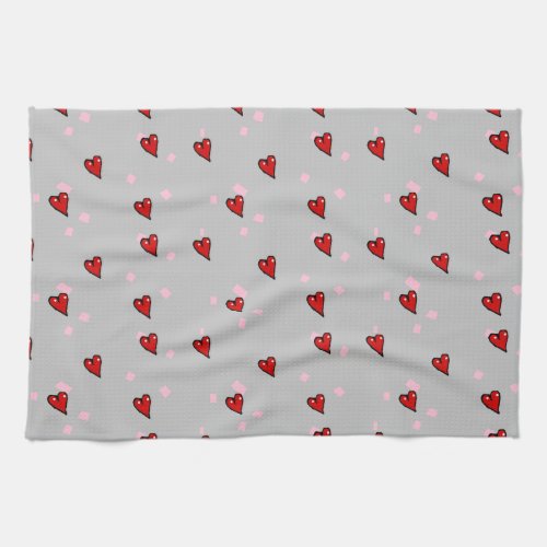 Red hearts on grey kitchen towel