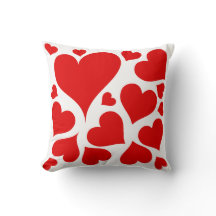 Red hearts on white love pillow