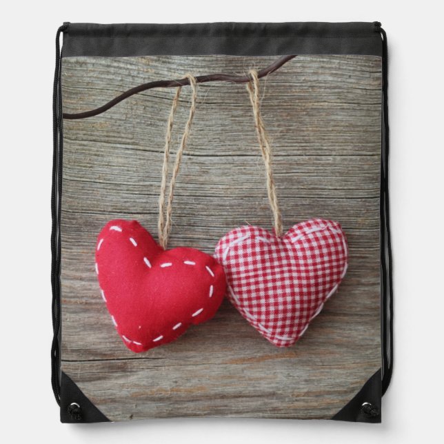 Red Hearts on Wooden Table 2 Drawstring Bag (Front)