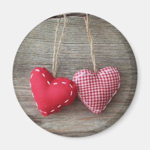 Red Hearts on Wooden Table 2 Magnet