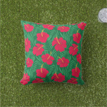 Red Hibiscus Flowers on Green Tropical Leaves 