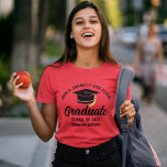 Red High School Graduate Custom Graduation T-Shirt<br><div class="desc">This classic red custom senior graduate t-shirt features classy white typography of your high school or college name for the class of 2024. Customize with your graduating year under the chic black handwritten script and black grad cap for a great personalized graduation tee for a party or keepsake gift for...</div>