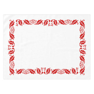 red hollies in white tablecloth