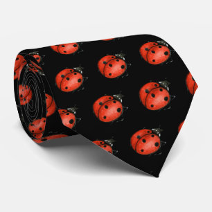 red ladybug on black neck tie