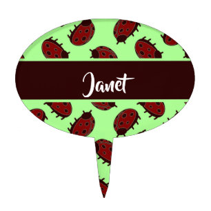 Red ladybugs on green cake topper