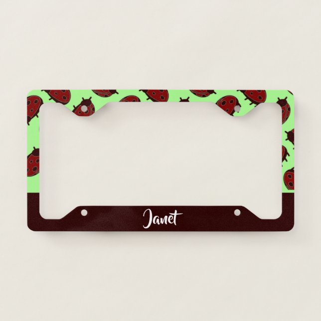Red ladybugs on green license plate frame (Front)
