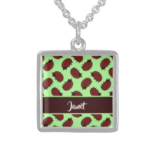 Red ladybugs on green sterling silver necklace