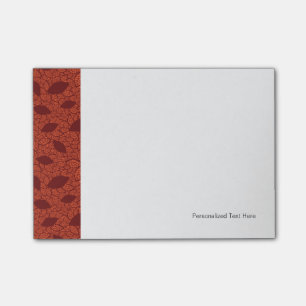 Red leaves pattern on orange post-it notes