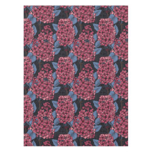 Red lilac on dark blue tablecloth