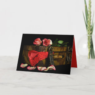 red lingerie and rose on old suitcase anniversary card