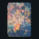 Red Maple Leaves in Water iPad Mini Cover<br><div class="desc">The image shows a collection of colorful maple autumn leaves floating in water. The leaves are predominantly orange, yellow, and red, creating a warm and vibrant palette. The water has a blue tint, providing a contrasting cool tone. The leaves are scattered across the surface, some partially submerged, creating a sense...</div>