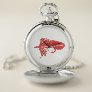 Red matuka streamer, fly tying and fishing pocket watch