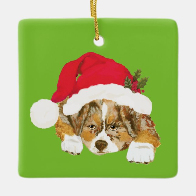 Red Merle Aussie Christmas Puppy w/Santa Hat Ceramic Ornament (Front)