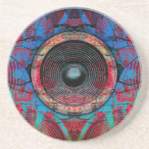 Red music speakers on a cracked wall sandstone coaster