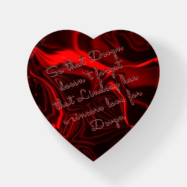 Red or nickel plated. paperweight (Front)