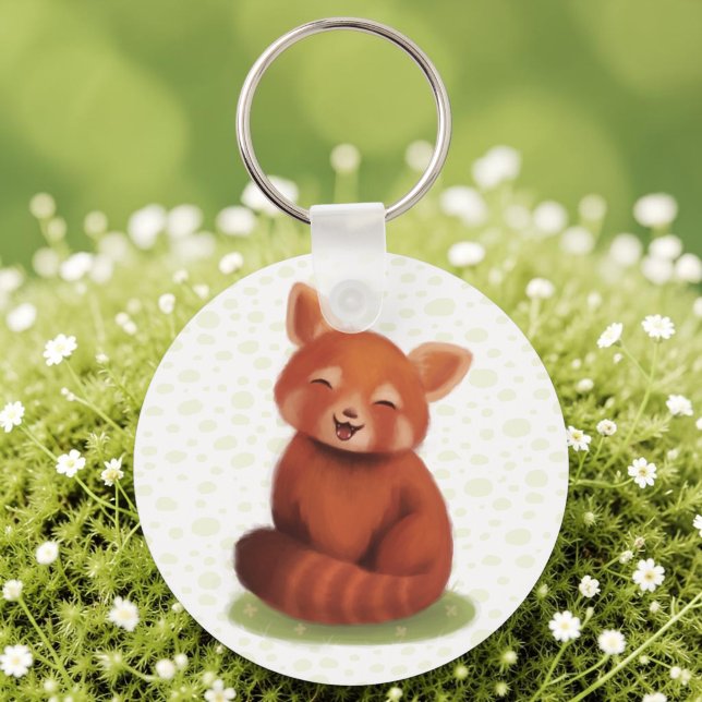Red Panda Keychain (A keychain with a hand-painted red panda, cute and smiling, laid on sunlit moss.)
