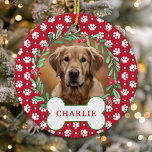 Red Paw Print Dog Photo Christmas Wreath Ceramic Ornament<br><div class="desc">Celebrate your furry friend this holiday season with this personalized red paw print dog photo Christmas wreath ornament. Featuring a festive wreath adorned with green leaves and red berries surrounding your pet's photo, this ornament adds a custom touch to your Christmas tree. Perfect for dog lovers who want to showcase...</div>