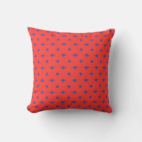 Red pillow with blue circles and rhombuses