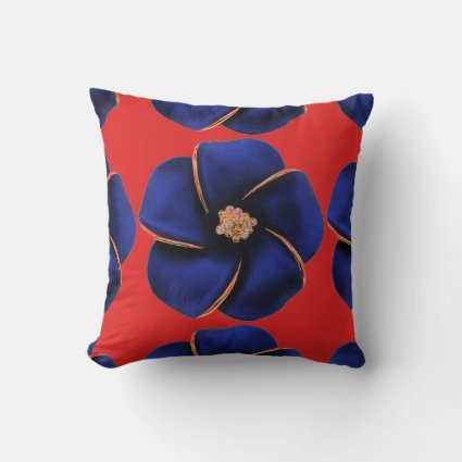 Red pillow with blue silk flowers