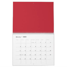 Red, pink, and orange garments hang side by side o calendar