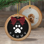 Red Plaid Bow Paw Print Pet Photo Wood Slice Ceramic Ornament<br><div class="desc">Add a rustic charm to your Christmas tree with our pet ornament featuring a rustic faux wood slice background decorated with a buffalo red plaid bow and white paw print. Customize with your pet's name and year. The reverse side features a place to add your pet's photo. Designed by Moodthology...</div>