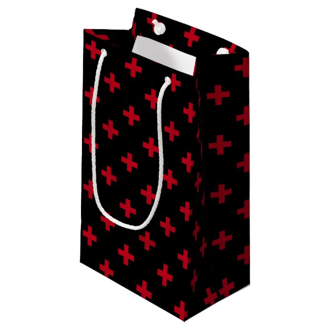 Red polka crosses on black small gift bag (Front Angled)