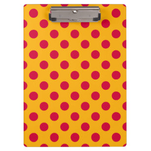 Red polka dots on yellow clipboard