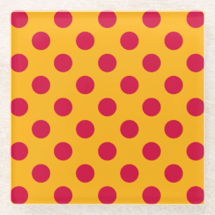 Red polka dots on yellow glass coaster