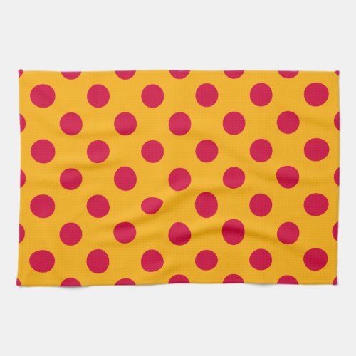 Red polka dots on yellow kitchen towel