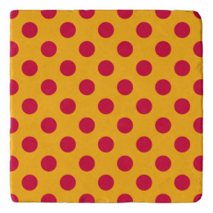 Red polka dots on yellow trivet